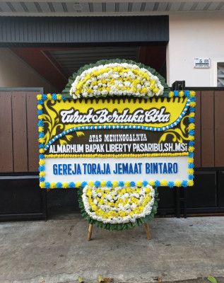 Papan Bunga Duka di Tahuna
